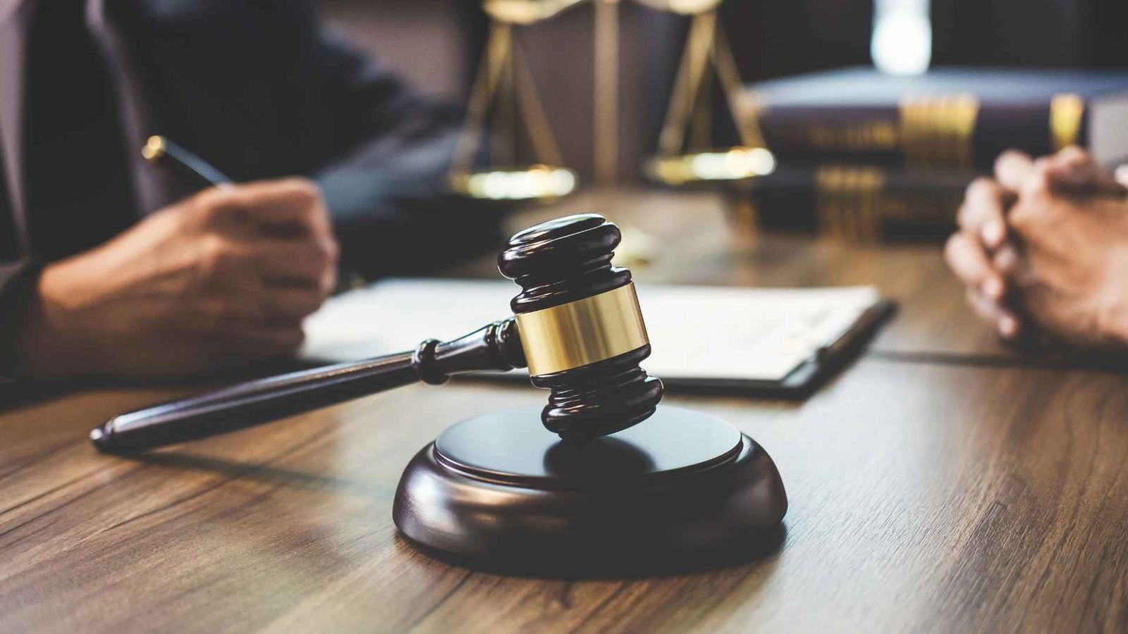 Gavel and scales of justice on a legal desk